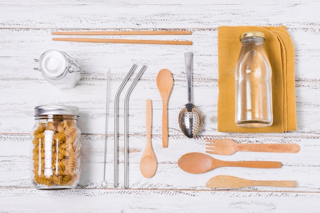 Free photo flat lay zero waste arrangement on wooden background