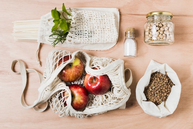 Free photo flat lay zero waste assortment on wooden background