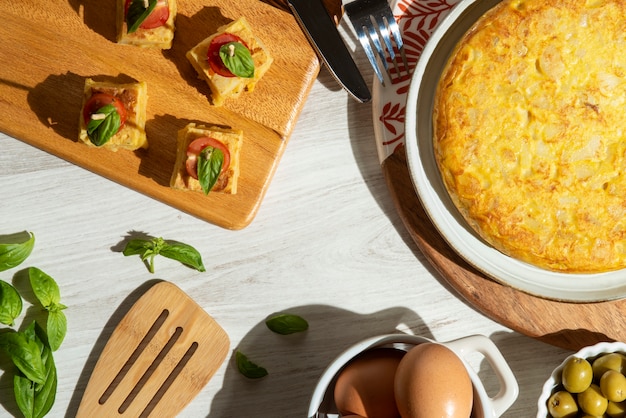 Free photo flat view of delicious spanish tortilla dish