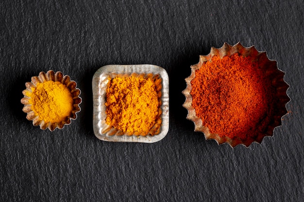 Free photo flay of assortment of spices with cinnamon and turmeric