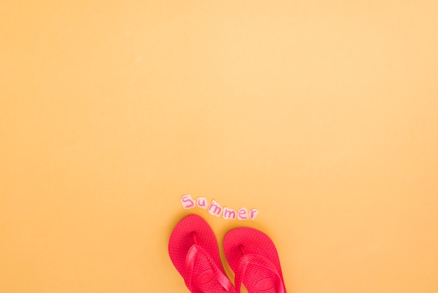 Free photo flip flops and summer word