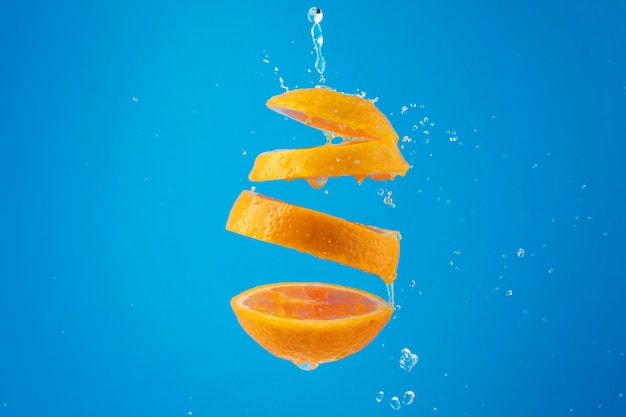 Free Photo floating slices orange with clear background