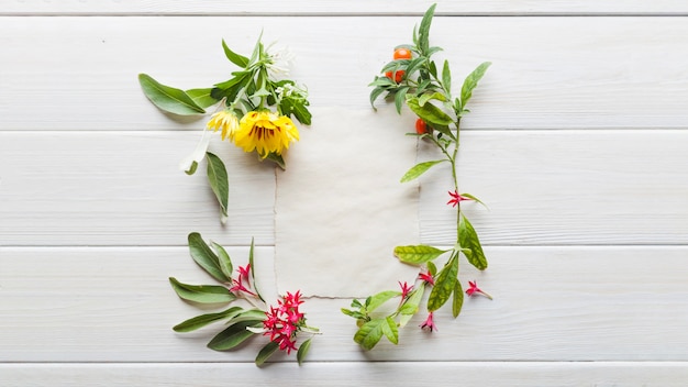 Floral arrangement with paper card