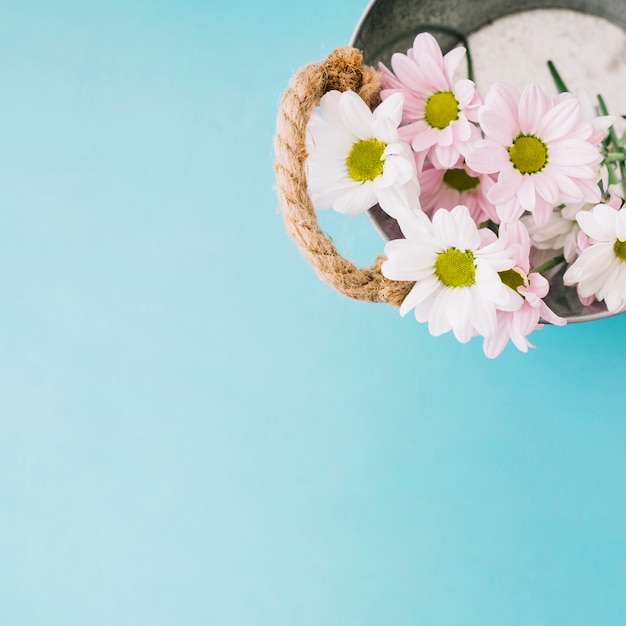 Free Photo floral composition with bucket