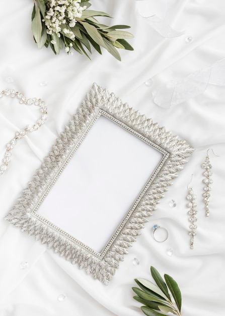 Free photo floral ornaments beside frame