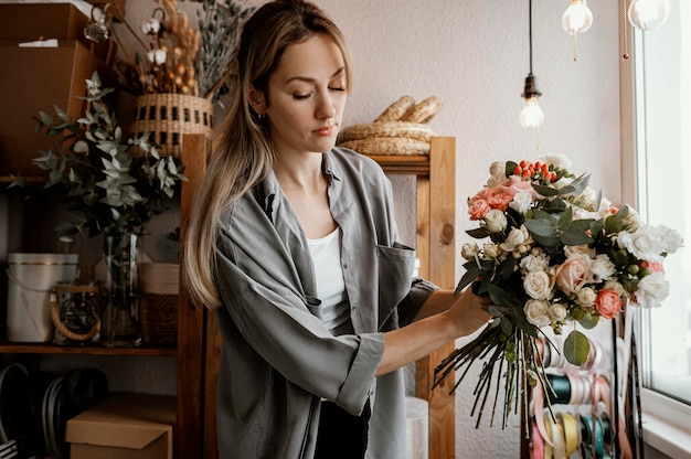 Florist making a beautiful floral arrangement