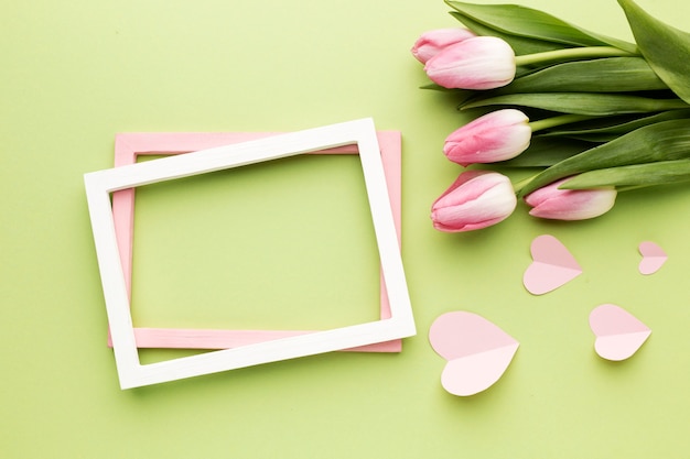 Free photo flowers beside frame