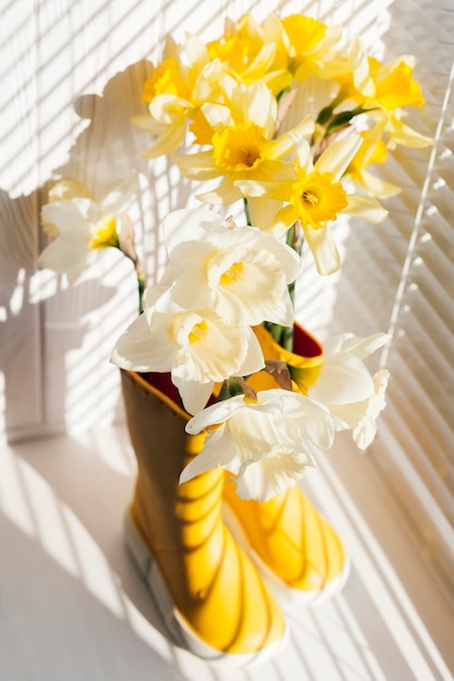 Flowers in some yellow boots