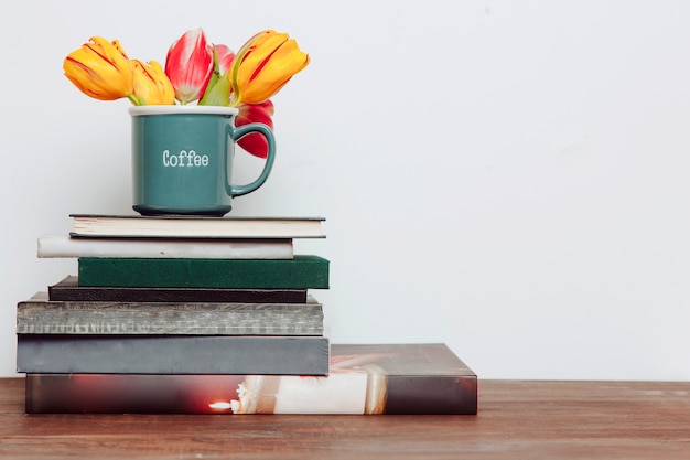 Flowers on stack of books