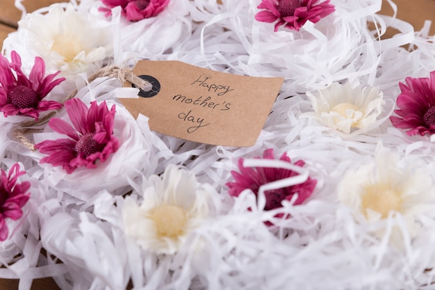 Free Photo flowers with mother's day tag