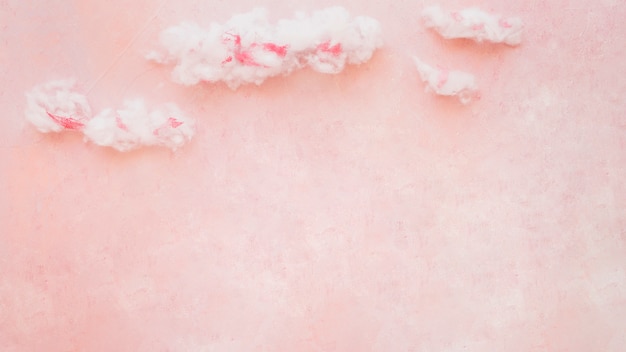 Fluffy clouds against grunge background