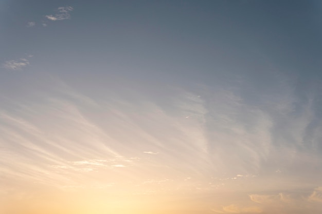 Free photo fluffy clouds on a windy sky with sun