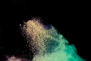 Free photo flying powder particles in air