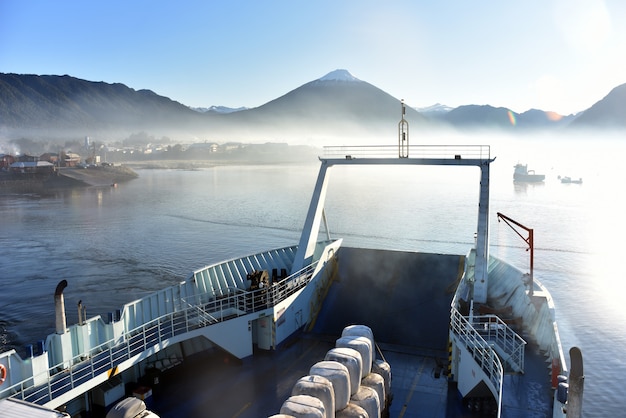 Free Photo foggy view of the lake and mountains from the boat