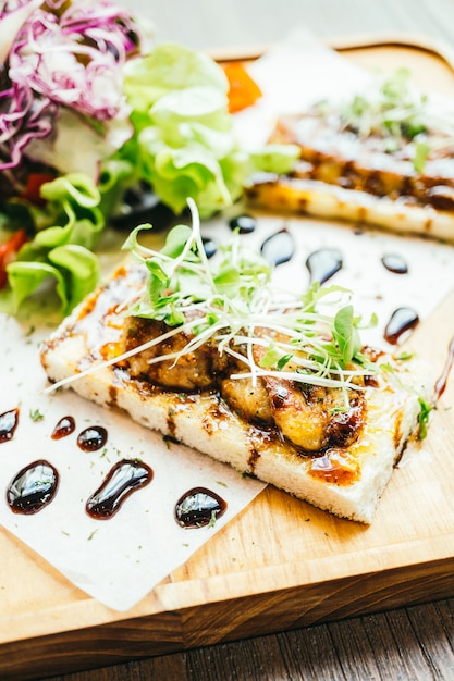 Foie gras on top of bread with sauce