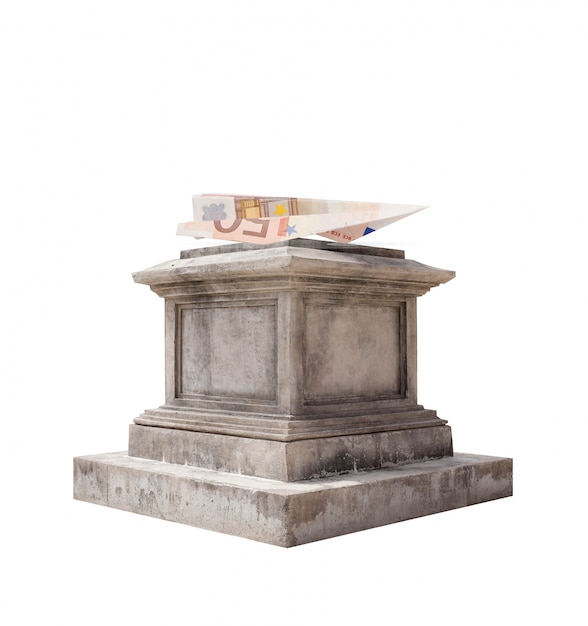 Free photo folded banknote on a marble pedestal