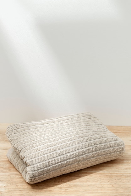 Free photo folded natural cotton towel