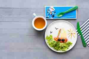 Free photo food art sailboat background, fun kids food