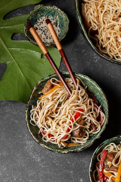 Free Photo food bowl with sticks flat lay