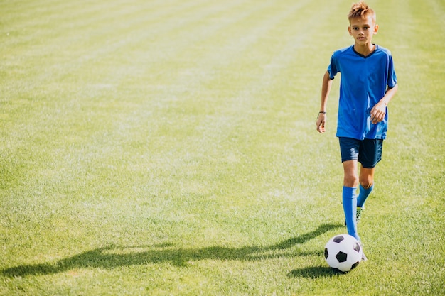 Free photo football player playing on the field