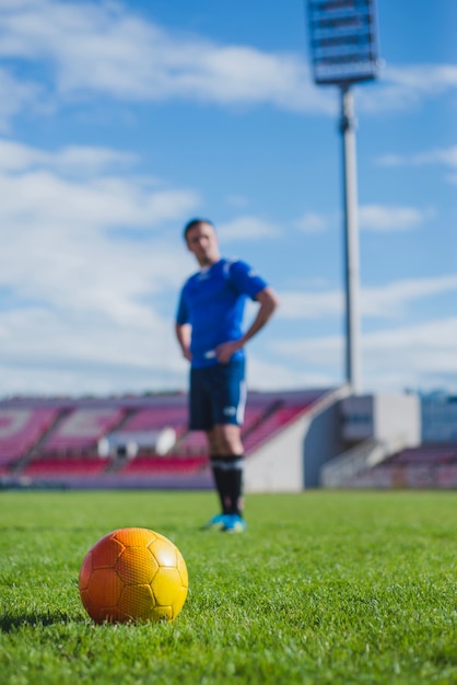 Free photo football player preparing for free kick