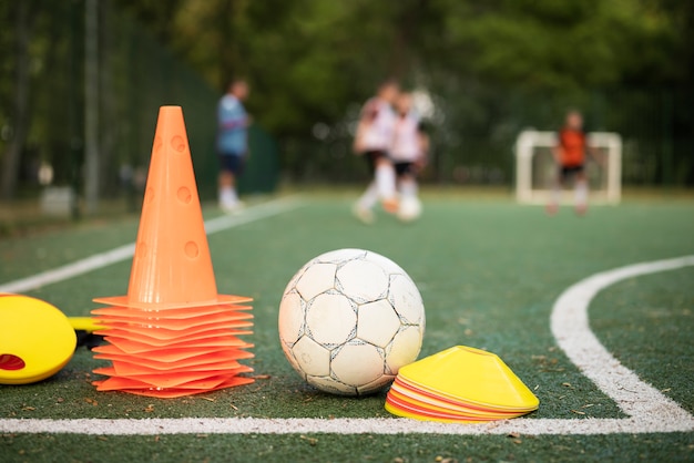 Football trainer teaching his pupils