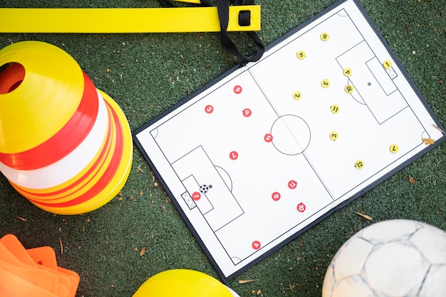 Free Photo football trainer teaching his pupils