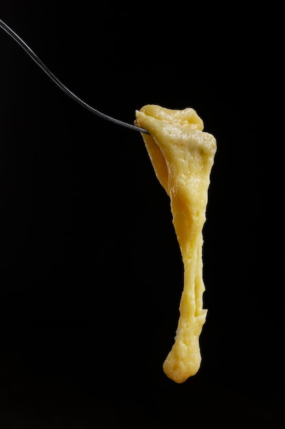 Free Photo fork with melted cheese