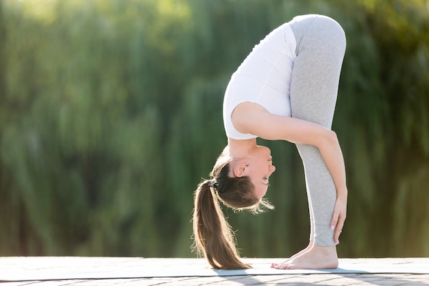 Forward bend head to knees pose