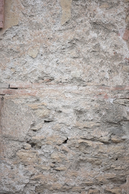 Free photo fragment of old grungy texture with chipped paint and cracks or grey concrete wall and cement surface