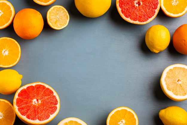 Frame formed by mix of citrusses on table