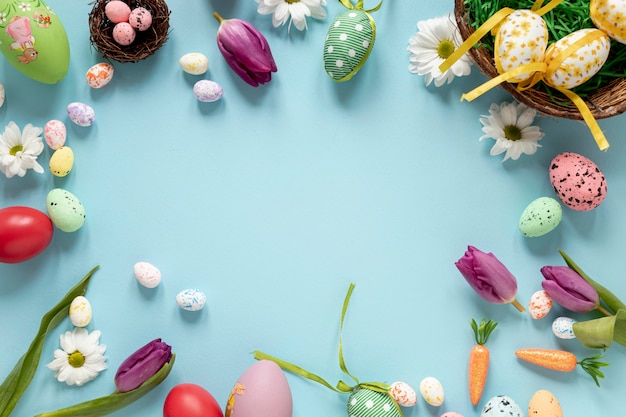 Frame made of ornaments and eggs for easter