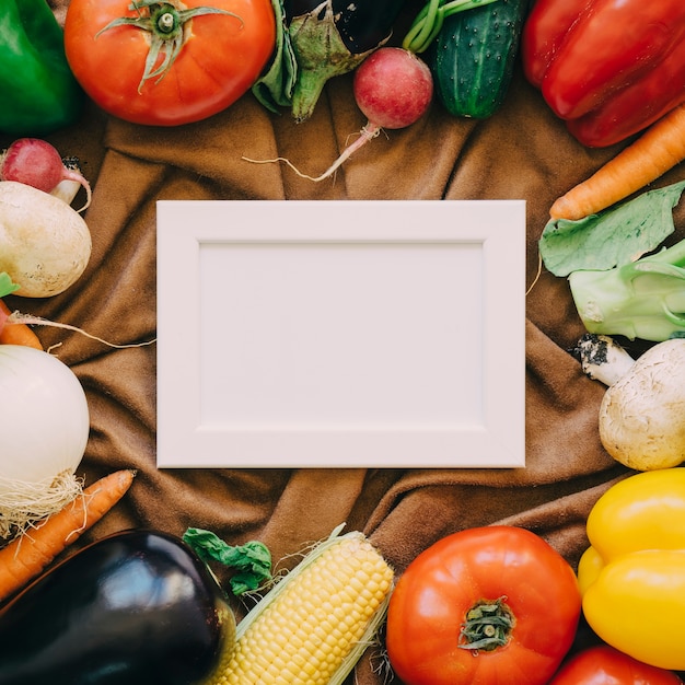 Free photo frame and vegetables