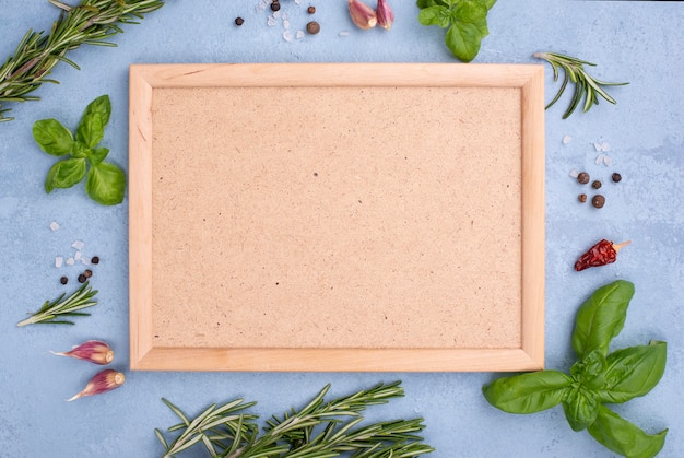 Free photo frame with ingredients beside