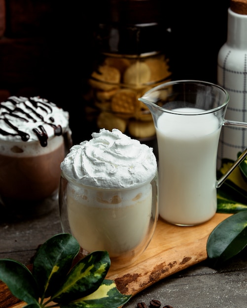 Frappuccino with coffee and milk on the table