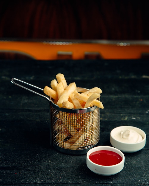 Free Photo french fries with  mayonnaise and ketchup