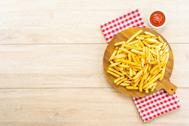 French fries with tomato or ketchup sauce