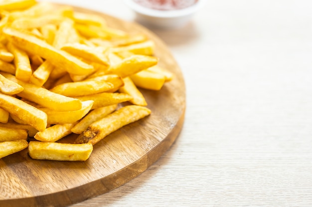 French fries with tomato or ketchup sauce