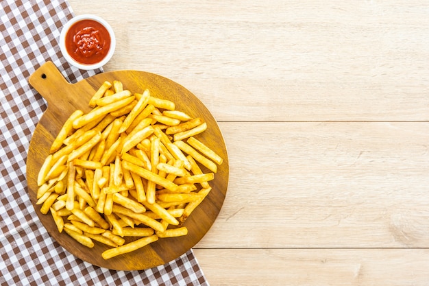 French fries with tomato or ketchup sauce