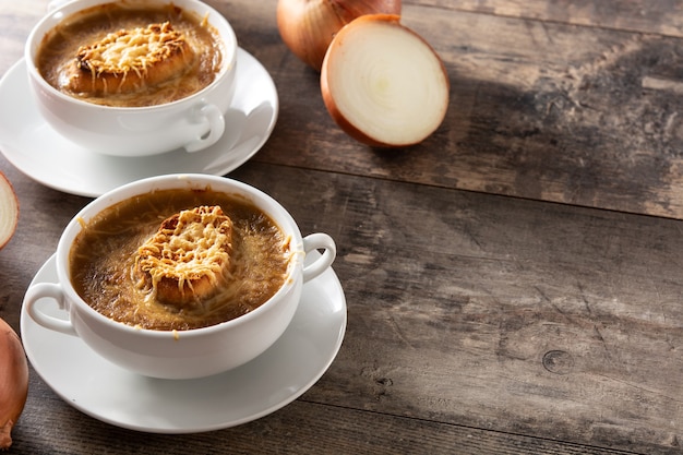 French onion soup on wooden table