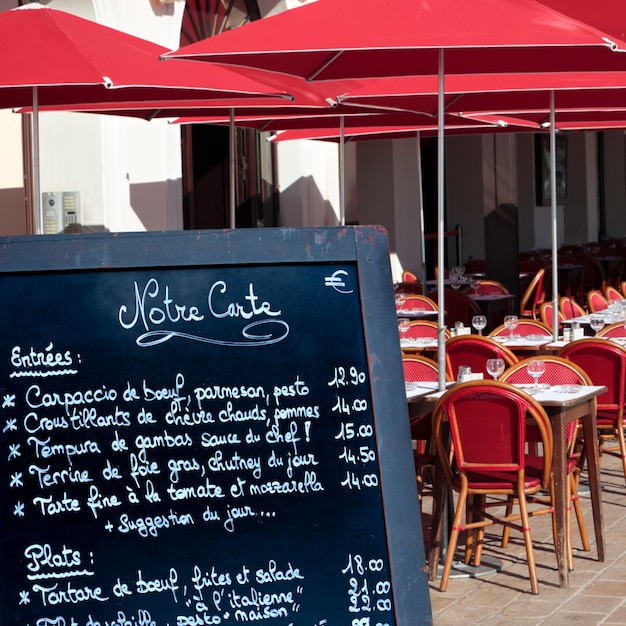 French restaurant menu board on the street