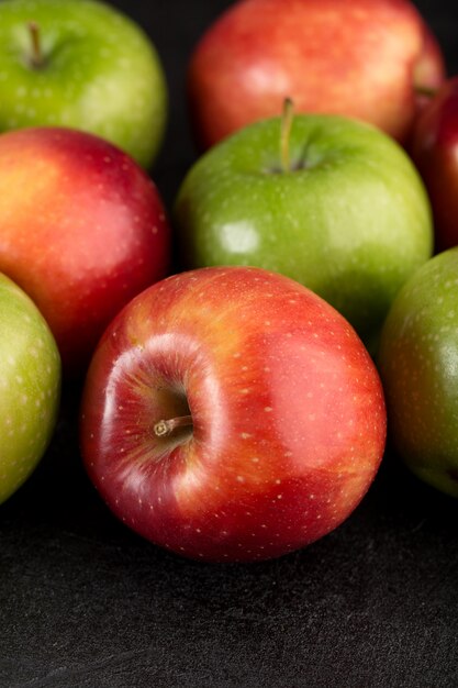 Fresh apples red and green fresh mellow ripe isolated on grey desk