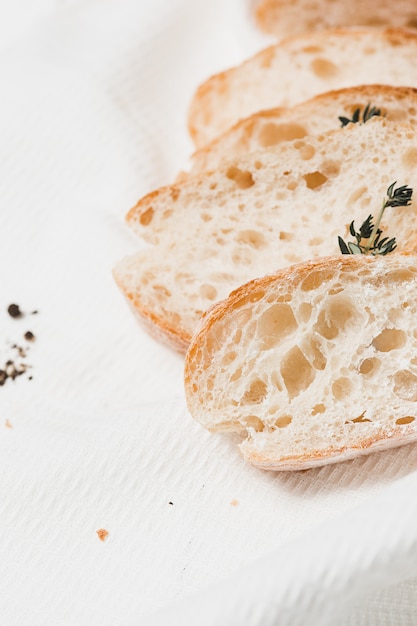 Free Photo the fresh bread on a white table