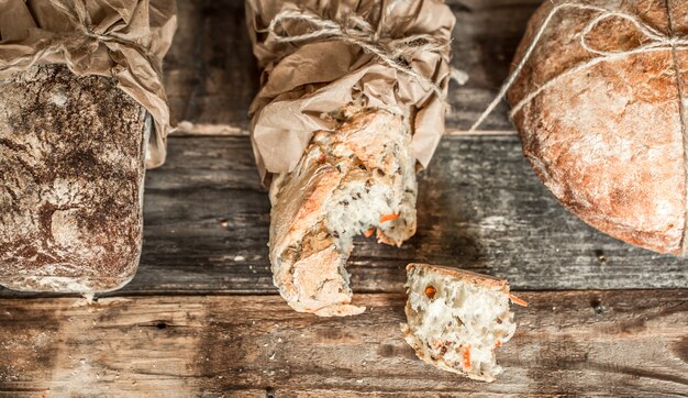 fresh bread on wooden background