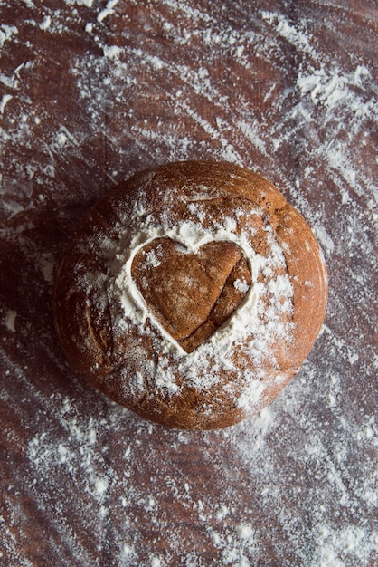 Free photo fresh bun on the table top view