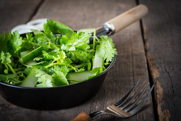 fresh cilantro salad, coriander with cucumber salad. Healthy food concept.