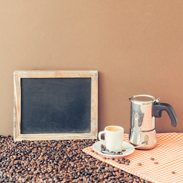 Free photo fresh coffee composition with slate