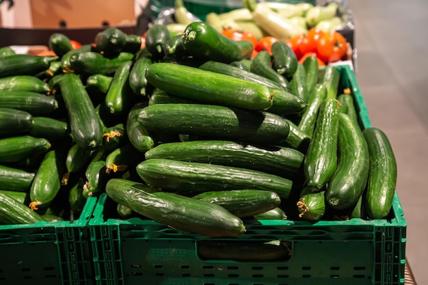 Free photo fresh cucumber in box sale green grocery food store