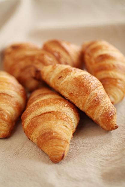 Fresh french croissants on a tablecloth