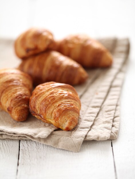 Fresh french croissants on a tablecloth